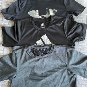 Boys athletic short sleeve shirts, size Small.